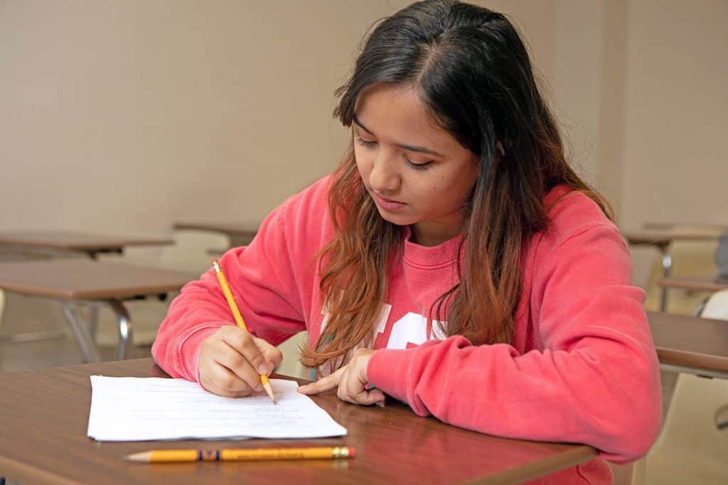 McNeese student in classroom taking test