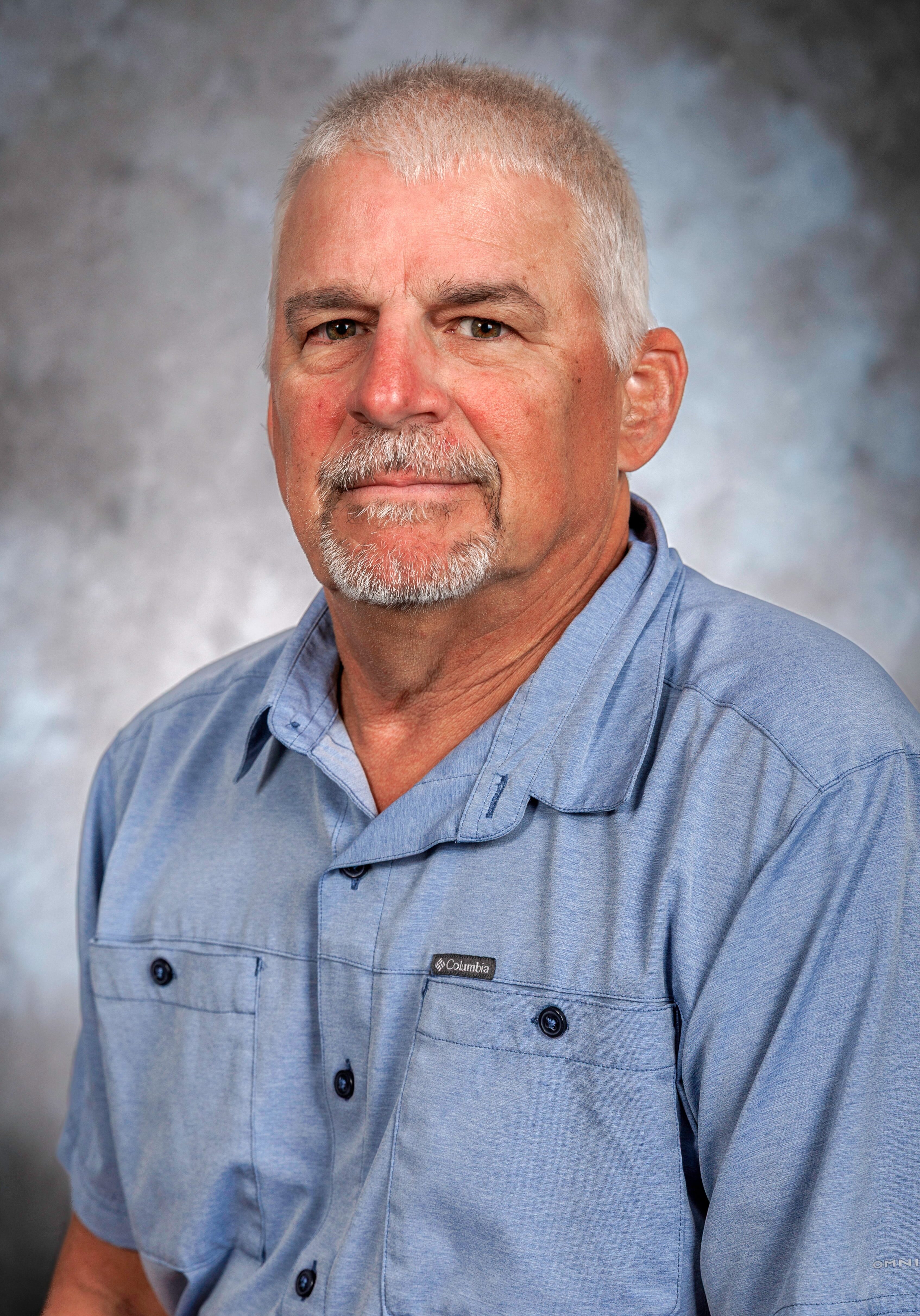 Headshot of Mark Merchant