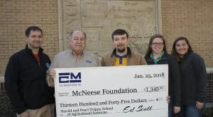 Dr. Chip LeMieux, Kealy Stelly and Shae Doucet of McNeese stand with Ed Scott of Cal-Maine Foods