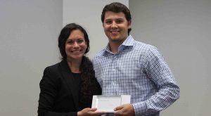 Joseph Provenzano accepts the Jeff and Rhonda Miller Distinguished Senior in the College of Business Award.