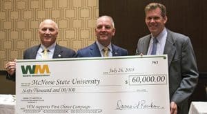 McNeese President Dr. Daryl Burckel, Gov. John Bel Edwards and Jim Fish, Waste Management president and CEO.