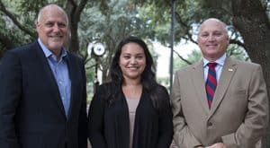 Rainwater, Lissette Tersiev, radiologic sciences major from Fort Polk, and Dr. Daryl Burckel, McNeese president