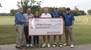 Richard H. Reid, vice president for university advancement and executive vice president for the foundation; David Thompson, Market Basket director of merchandising; scholarship recipient Gabrielle Ashford, Lake Charles education major; Russell Saleme, Market Basket vice president of sales and marketing; Steve Cormier, Market Basket vice president of retail operations; and Skylar Thompson, Market Basket president.