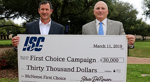 Steve DeRouen, left, vice president of the Lake Charles Region of ISC Constructors, LLC, and McNeese President Dr. Daryl V. Burckel