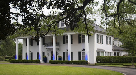 President's house lit blue for autism month.