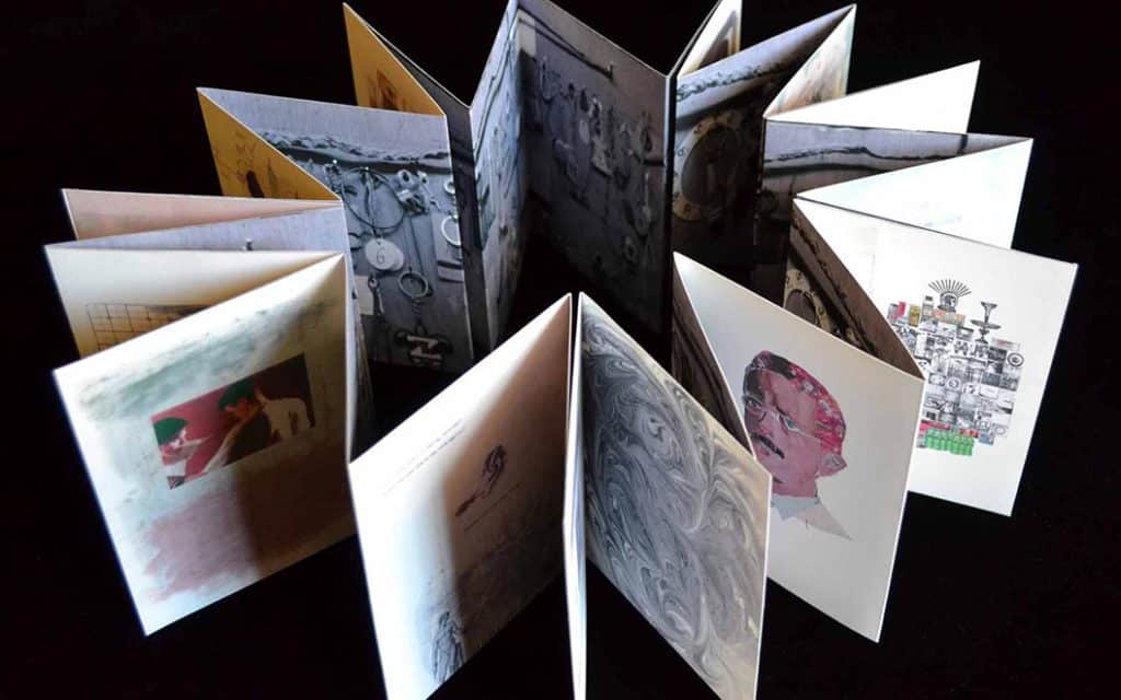 An accordion book of Heather Ryan Kelley's art shot from the top