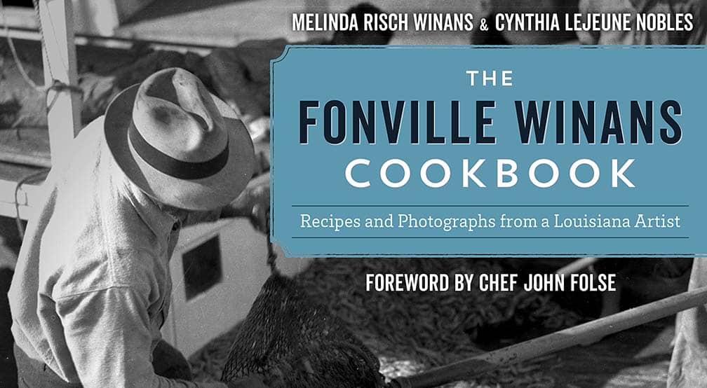 Man empties a sack of shrimp on The Fonville Winans Cookbook cover