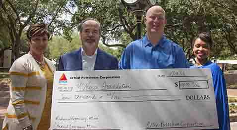 Foundation.Citgo.CoE donation.4.18.18.crop Mickey Mancuso, Ryan Vining and Petula Glaspie of Citgo present a check to Dr. Niko Kiritsis of McNeese.