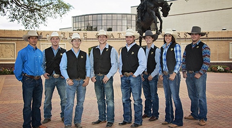 The rodeo team stands at the entrance plaza. The team will represent McNeese at the 70th College National Finals Rodeo.