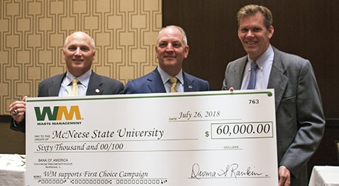 McNeese President Dr. Daryl Burckel, Gov. John Bel Edwards and Jim Fish, Waste Management president and CEO.