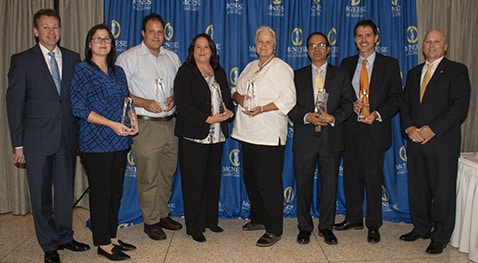 L’Auberge Casino Resort Vice President and General Manager Michael K. Pendergast; Dr. Nidal Daou, Burton College of Education; Dr. Derek D. Bussan, College of Science and Agriculture; Jennifer Barrow, College of Nursing and Health Professions; Dr. Catherine Anderson, College of Engineering and Computer Science; Dr. Md Al-Emran College of Business; Dr. Philippe Girard, College of Liberal Arts; and McNeese President Dr. Daryl Burckel.