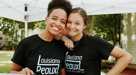 reauxl Whitney Moss and a worker representing Louisiana Reauxl