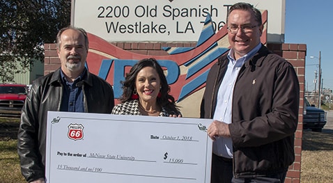 Foundation.Phillips.66. crop Dr. Nikos Kiritsis, college dean, Megan Hartman, Phillips 66 public relations manager, and Richard G. Harbison, Phillips 66 plant manager