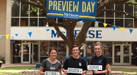 Students with Preview Day memorabilia are all smiles after a great day on campus