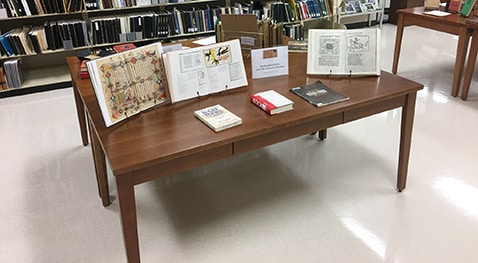 Books are on display during the rare books petting zoo