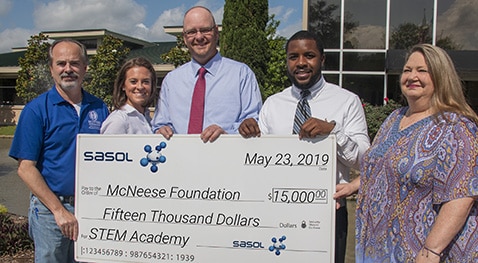 Dr. Nikos Kiritsis, dean of the McNeese College of Engineering and Computer Science, Sasol representatives Megan Villanueva, process engineer, Eddie Williams, project engineer, and Jalen Hargraves, electrical project engineer I, and LaDonna McKnight, STEM Academy coordinator.