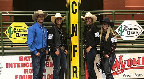 From left to right, coach Justin Browning and women’s team national champions Mia Manzanares, Kati Murphy and Ashleigh Young (Grace Hanley not pictured).