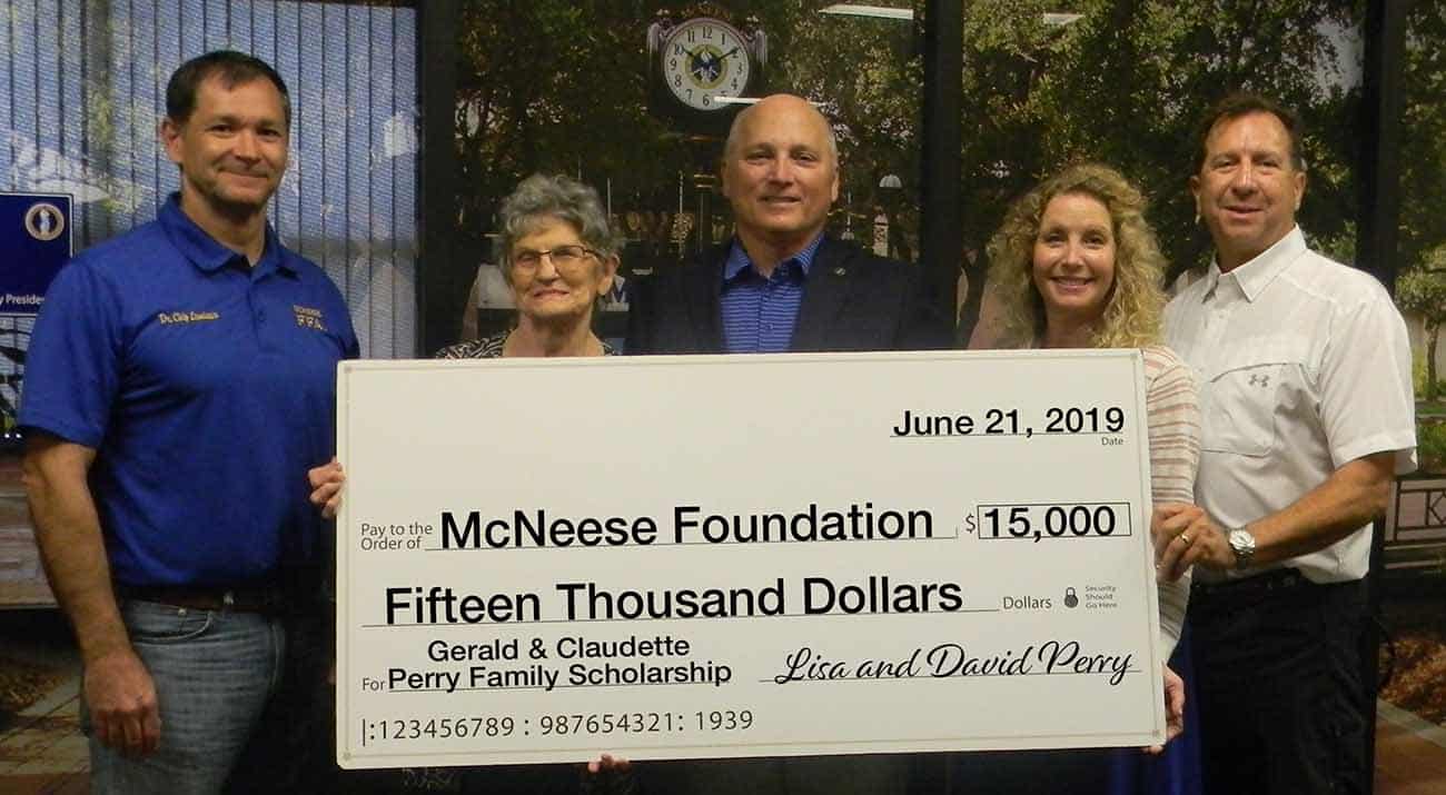 Foundation.Perry-donation.6.19.crop_ On hand for the presentation are, from the left, Dr. Chip LeMieux, dean of the College of Agriculture; Dr. Daryl Burckel, McNeese president; and Lisa and David Perry.