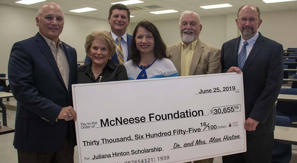 Dr. Daryl Burckel, McNeese president; Dr. Juliana Hinton, professor of biological science; Dr. M. Alan Hinton; Bridget Hinton; Richard H. Reid, vice president for university advancement and executive vice president for the McNeese Foundation; and Dr. William Dees, professor and head of the biology department at McNeese.