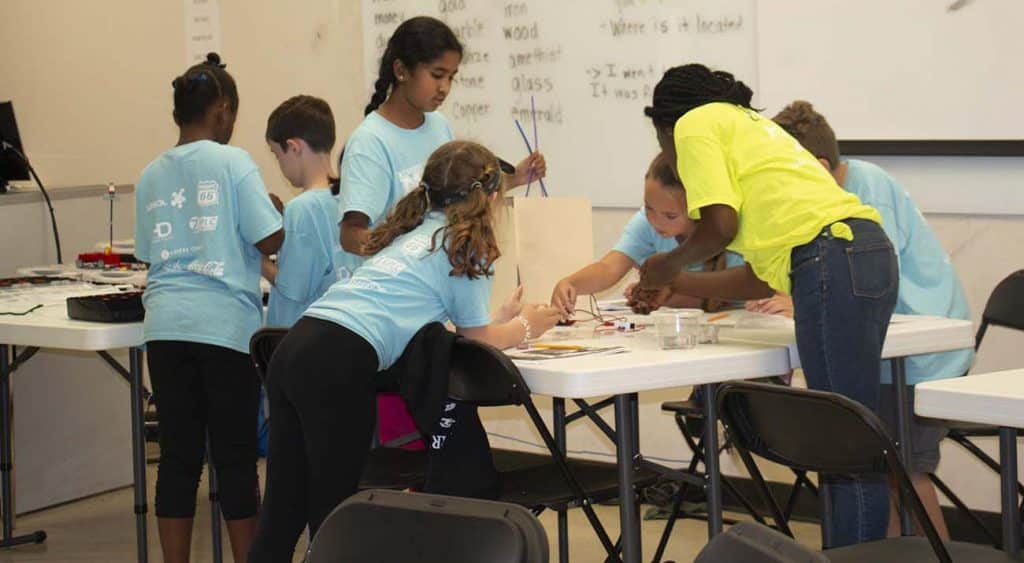 Students work together to complete an activity at STEM Academy.