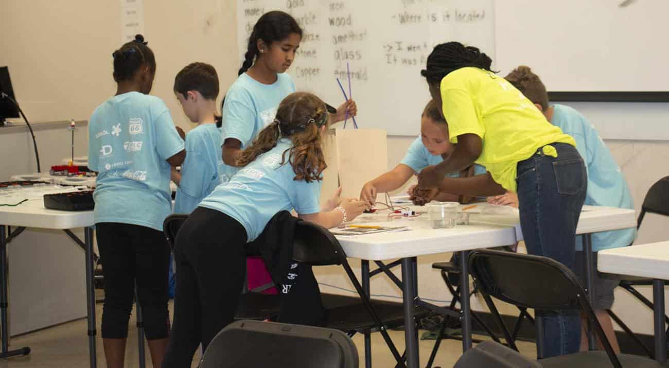 Stem academy Students work together to complete an activity at STEM Academy.