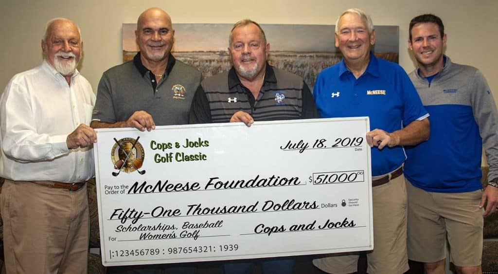 On hand for the presentation are from the left: Richard H. Reid, vice president for university advancement and executive vice president for the McNeese Foundation; Alan Heisser, Cops and Jocks; retired Lake Charles Police Chief Don Dixon, Cops and Jocks; Mike Fluty, women’s golf head coach; and Justin Hill, baseball head coach.