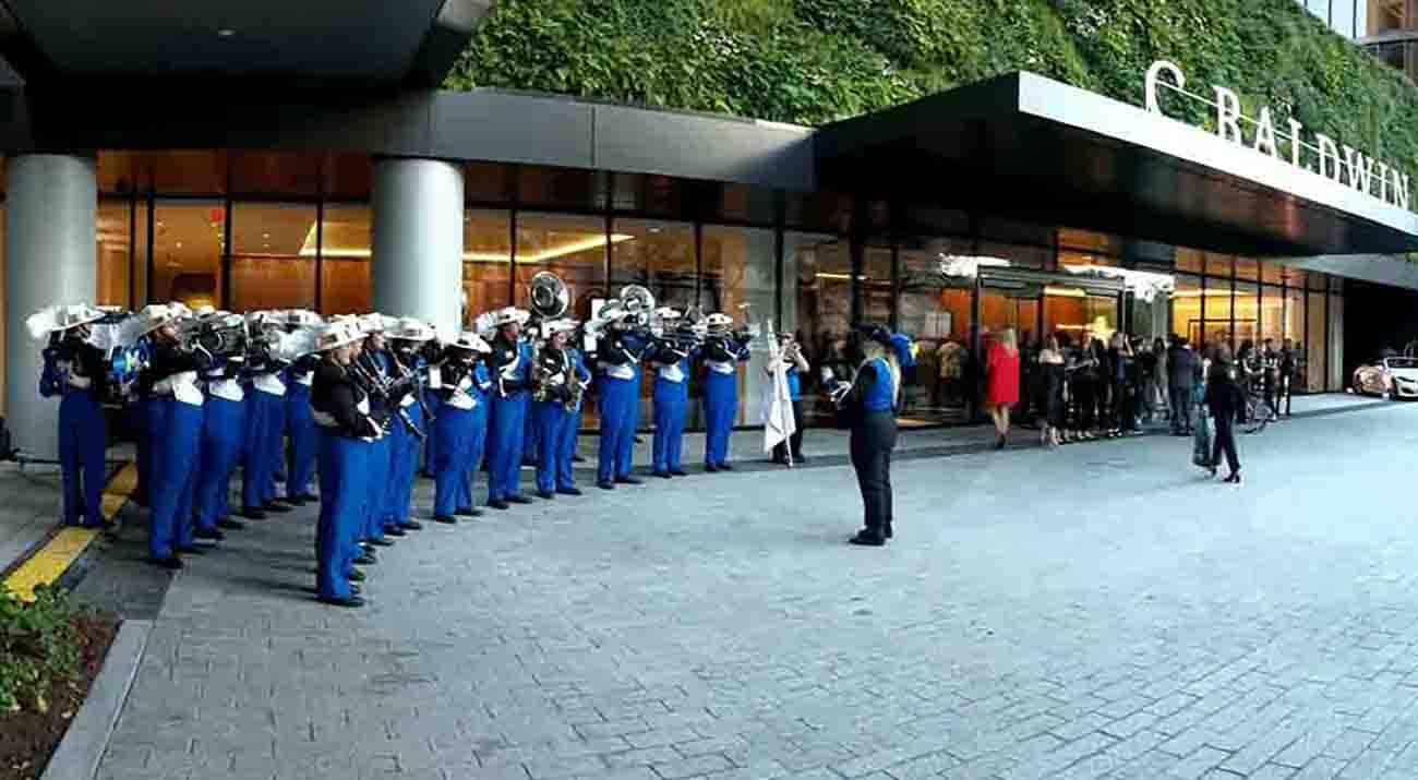 The Pride of McNeese play outside the C Baldwin Hotel