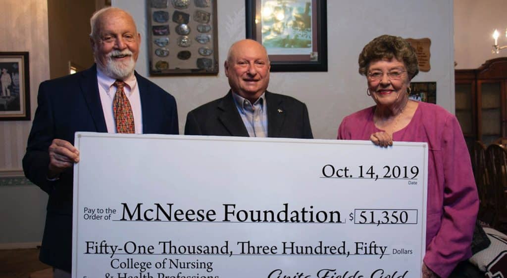 On hand for the donation are, from left, Richard H. Reid, vice president for university advancement and executive vice president for the McNeese Foundation, Maurice Gold and Dr. Anita Fields-Gold.