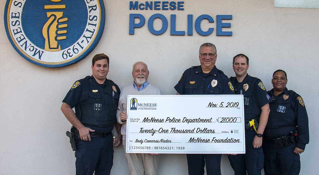 On hand for the donation are, from left: John Gill, McNeese police officer, Richard Reid, vice president for university advancement and executive vice president for the McNeese Foundation, Will Scheufens, McNeese chief of police, Tim Swim, McNeese police sergeant, and Stephanie Bryant, McNeese police officer.