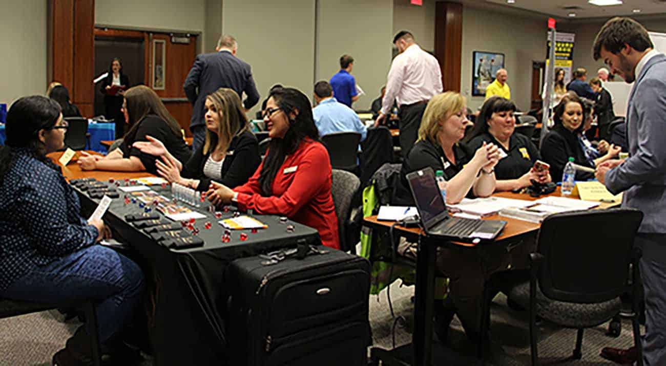 Students talk with potential employers at the Internship Soiree