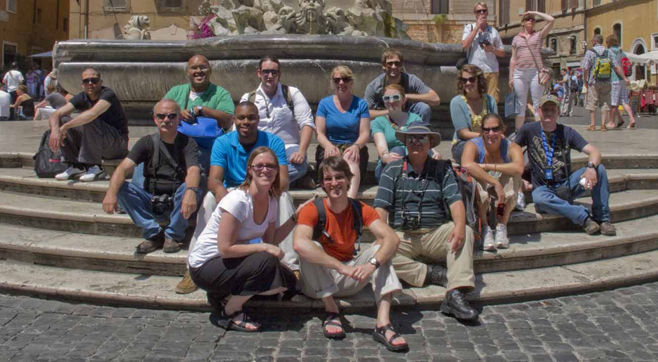 Bridget McDaniel, top row third from left, with a class in Italy.