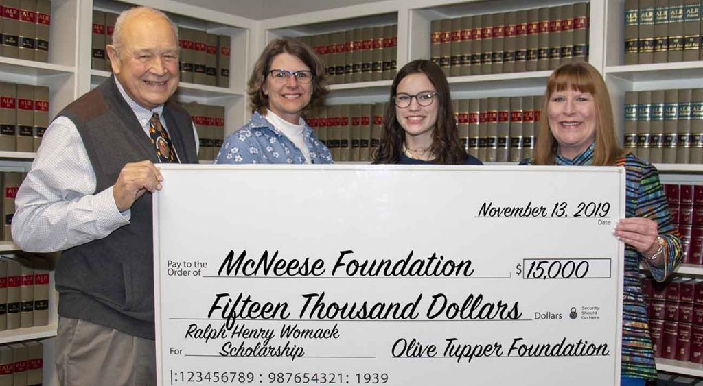 On hand for the presentation are, from left, Edwin K. Hunter, Tupper Foundation trustee, Melissa Womack Gilmore, Piper Gilmore and Melissa Ellis Northcutt, director for university advancement operations and special events.