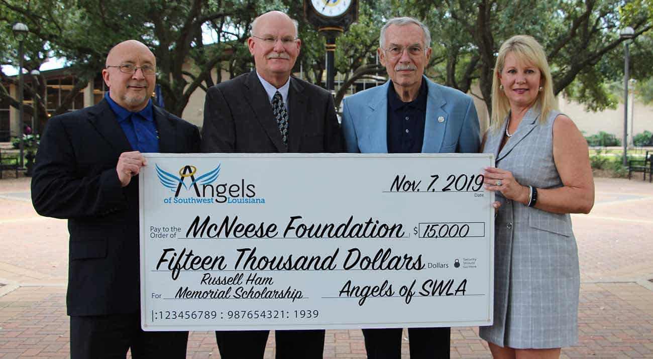 On hand for the donation are (from left to right): Dr. Mitchell Adrian, McNeese provost and vice president for academic affairs and enrollment management; Dr. Tim Hall, college dean; Ron McGinley, managing director for the Angels of Southwest Louisiana; and Angela Queenan, foundation board member.