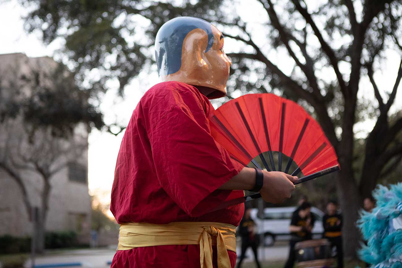 Asian-Experience Student in cultural dress