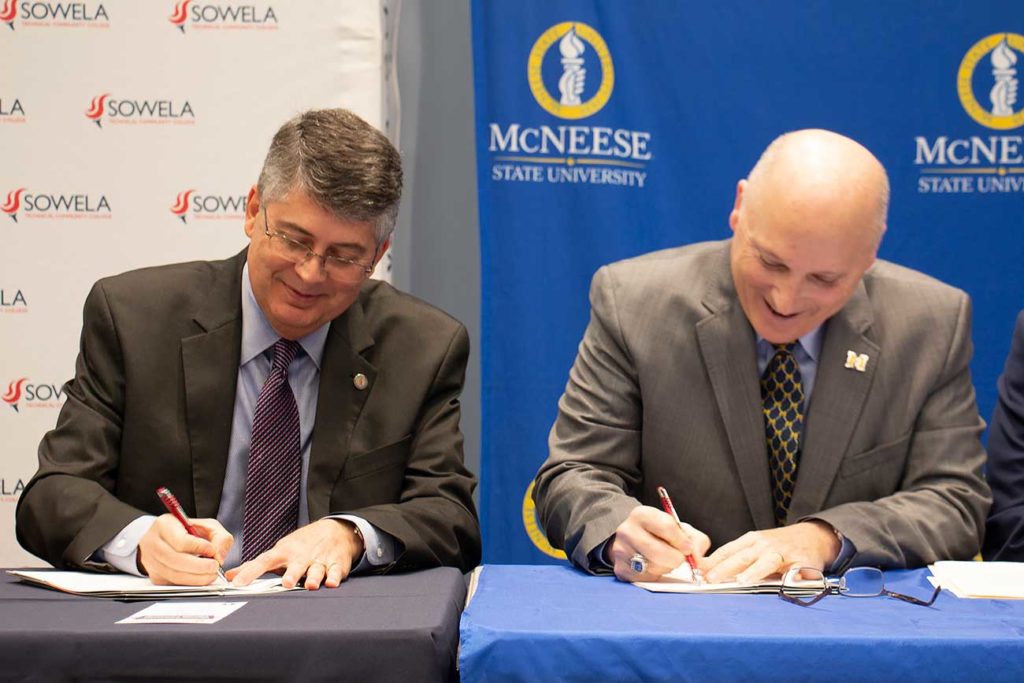 Aspinwall and Burckel sign MoU agreement