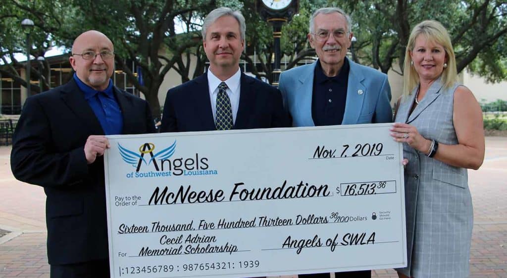 On hand for the donation are (from left to right): Dr. Mitchell Adrian, McNeese Provost and Vice President for Academic Affairs and Enrollment Management and Cecil Adrian’s son; Dr. Wade Rousse, College Dean; Ron McGinley, Managing Director for the Angels of Southwest Louisiana; and Angela Queenan, Foundation Board Member.