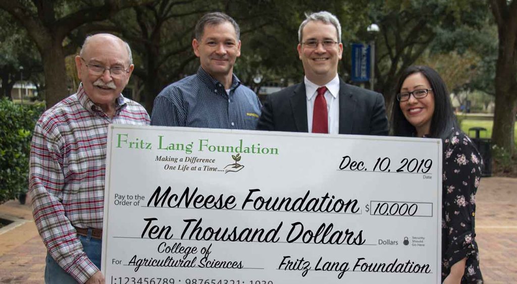 On hand for the presentation are from left to right: Dwight Bertrand, Instructor of Agricultural Sciences; Dr. Chip LeMieux, College Dean; E.F. Hunter III, Fritz Lang Foundation Representative and Adjunct Professor in the McNeese College of Business; and Nicole Jimenez, Special Projects Assistant in the McNeese Office of University Advancement.