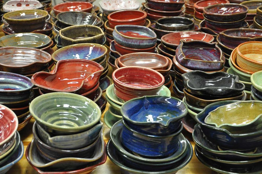 Ceramic bowls made by students and faculty