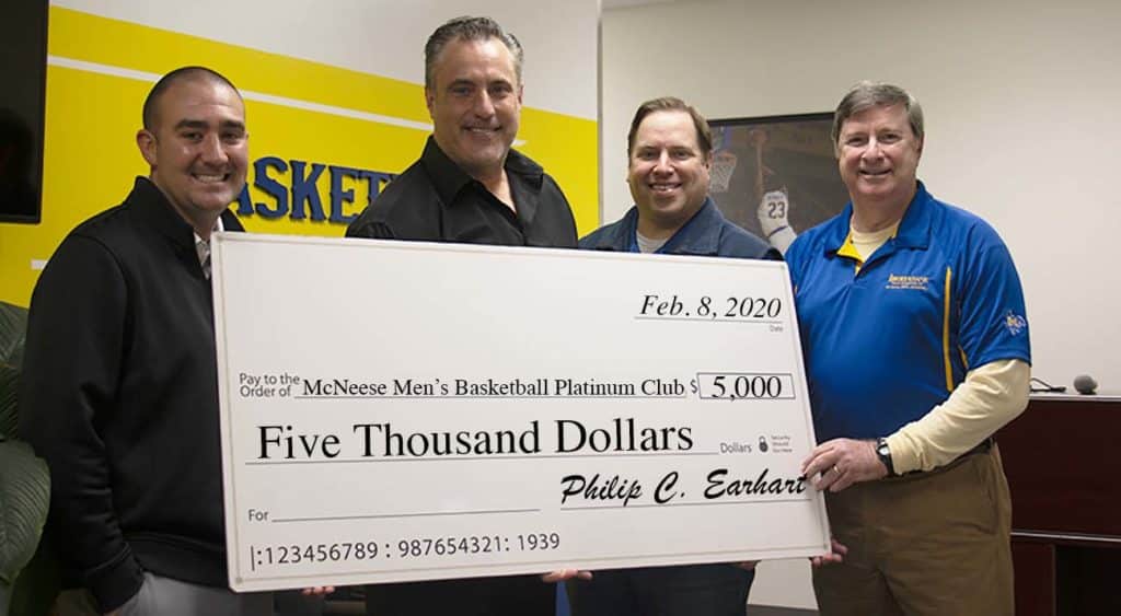 Left to right: Tanner Stines, Interim McNeese Athletics Director, Heath Schroyer, McNeese Men's Basketball Head Coach, Jason Martinez, IBERIABANK Retail Market Manager and Commercial Relationship Manager, and Phil Earhart, IBERIABANK Southwest Louisiana Market President.