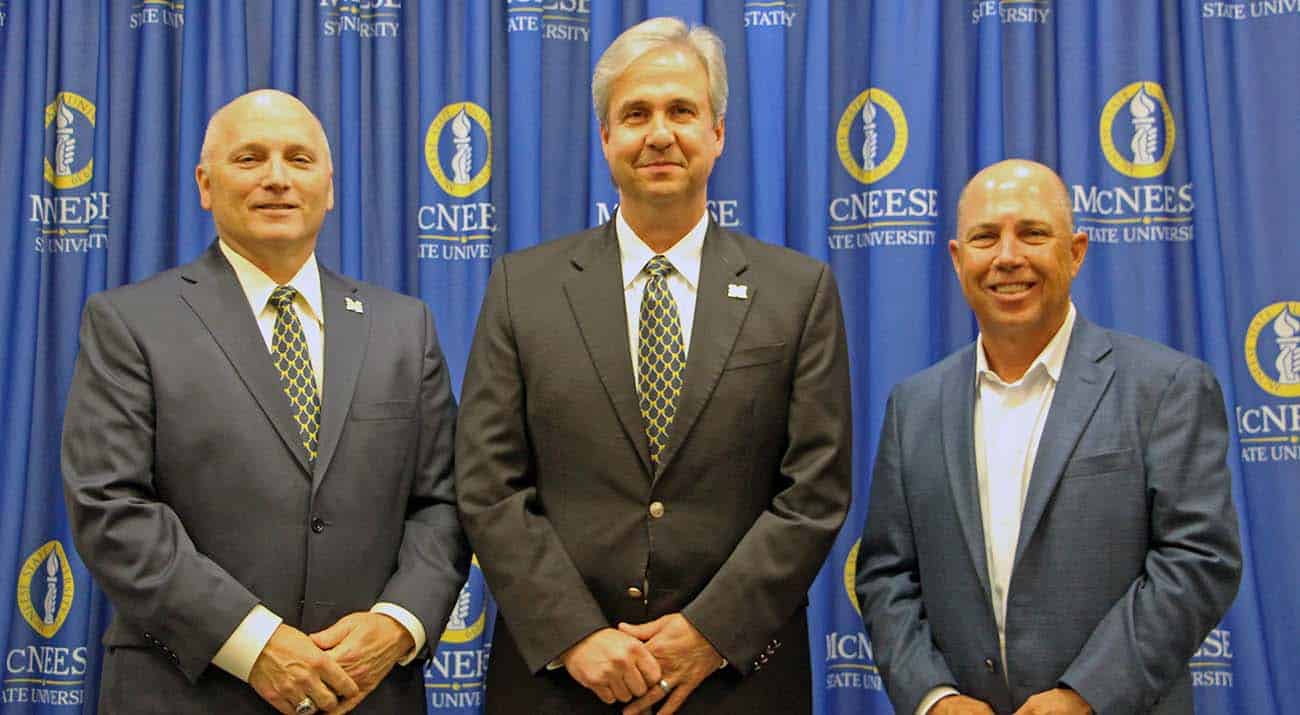 Dr. Burckel, Dr. Rousse and Ric Sanders stand together.