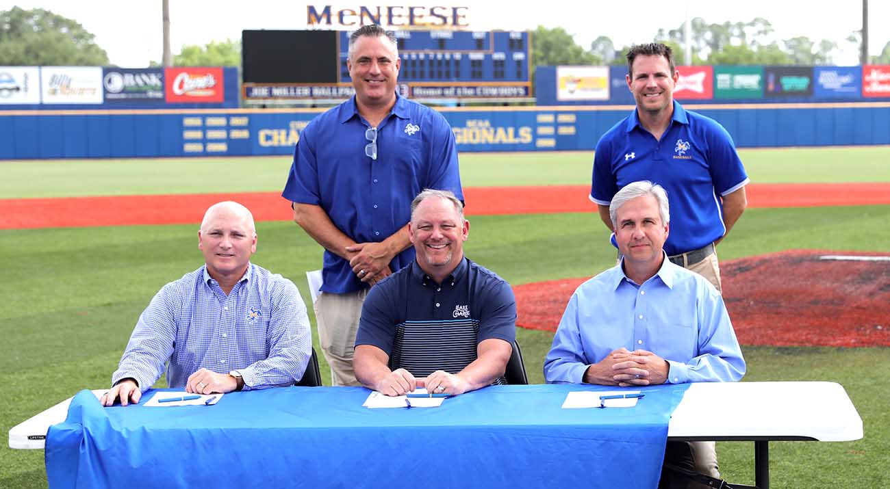 On the baseball field are McNeese President Dr. Daryl Burckel, Interim Director of Athletics Heath Schroyer, Kyle Edmiston, president and CEO of Visit Lake Charles, McNeese baseball head coach Juston Hill and Dr. Wade Rousse, McNeese vice president for University Advancement and executive vice president of the McNeese Foundation.