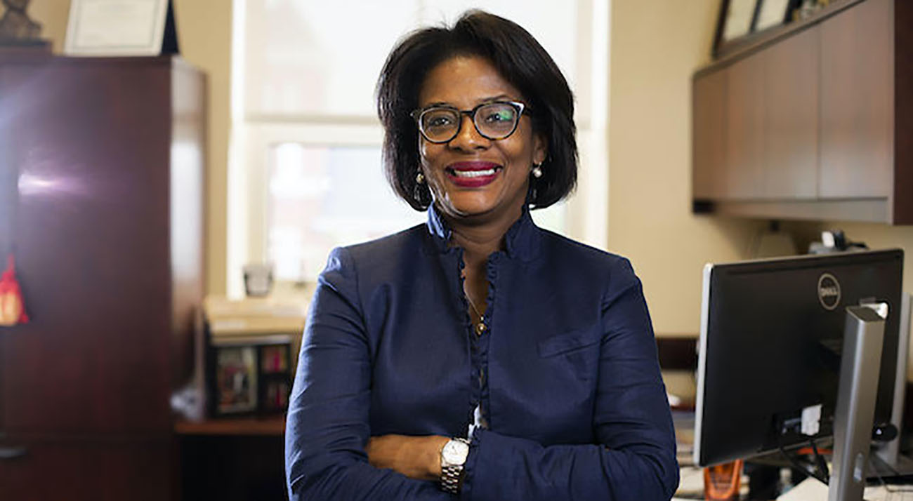 Dr. Sonja Feist-Price on August 23, 2019. Photo by Pete Comparoni | UKphoto Dr. Fiest Price in front of her desk.