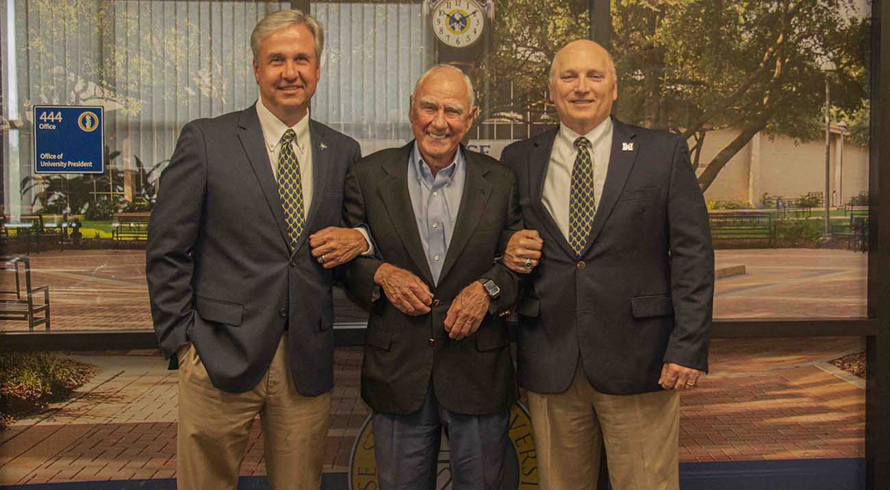 William J. Doré Sr. (center) recently presented a $500,000 donation to (L) McNeese State University’s Dr. Wade Rousse, vice president for university advancement and dean of the college of business, and McNeese President Dr. Daryl Burckel as part of a $1 million commitment to the McNeese First Choice Campaign.