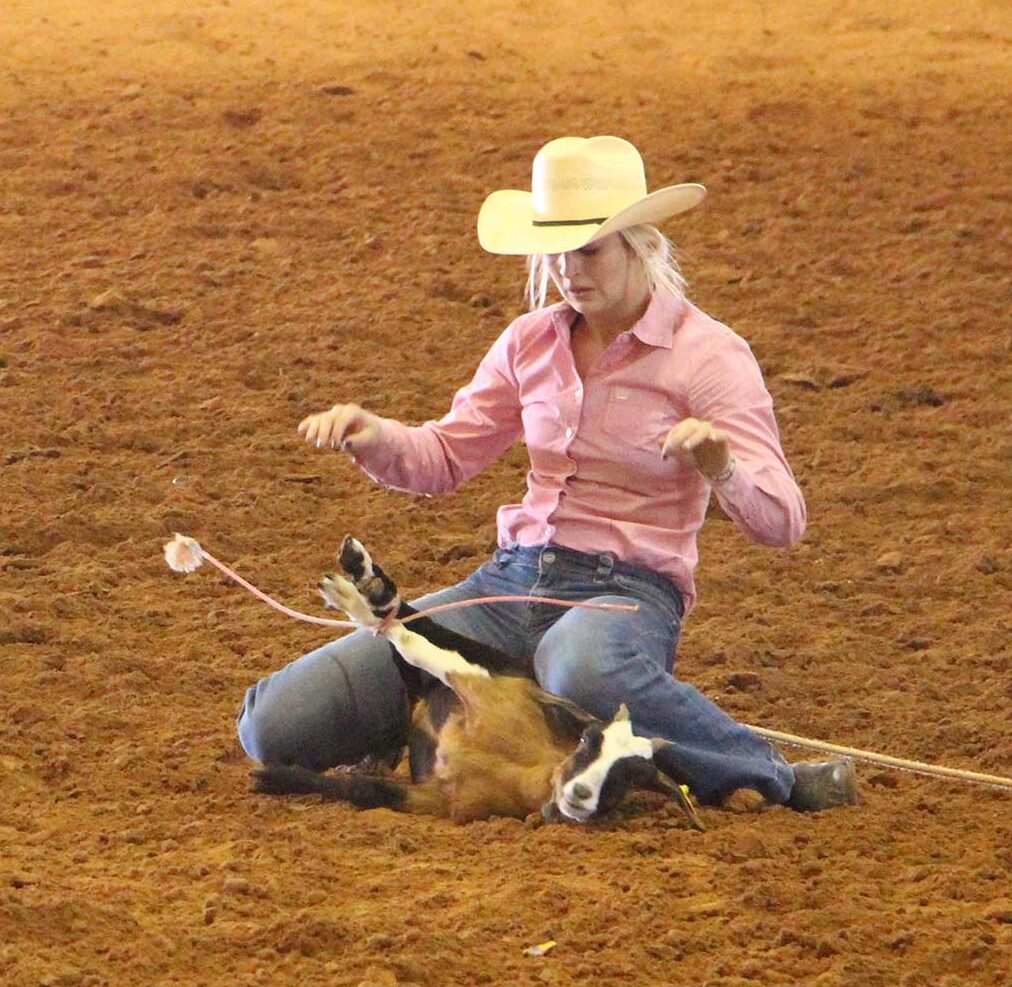 McNeese women's team member ties goat during competition