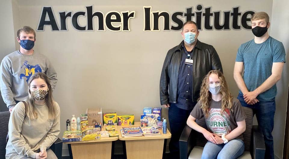 Seated from left: Baylee Veillon and Alexis Bourg, and standing from left: Wesley Vidrine, Troy Thompson, Assistant Professor of Nursing, and Cullen Johnson.