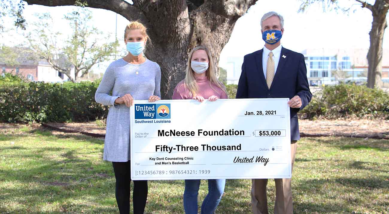 On hand for the presentation are, from left, Denise Durel, United Way of Southwest Louisiana President and CEO, Caitlyn Kudrecki, Suicide Prevention Program Coordinator for the Kay Doré Counseling Clinic, and Dr. Wade Rousse, Vice President for University Advancement and Dean of the College of Business.