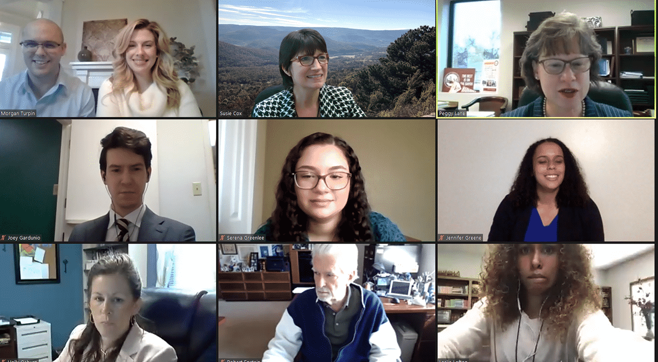 Members of the College of Business appear smiling on screen as they virtually attend a seminar.