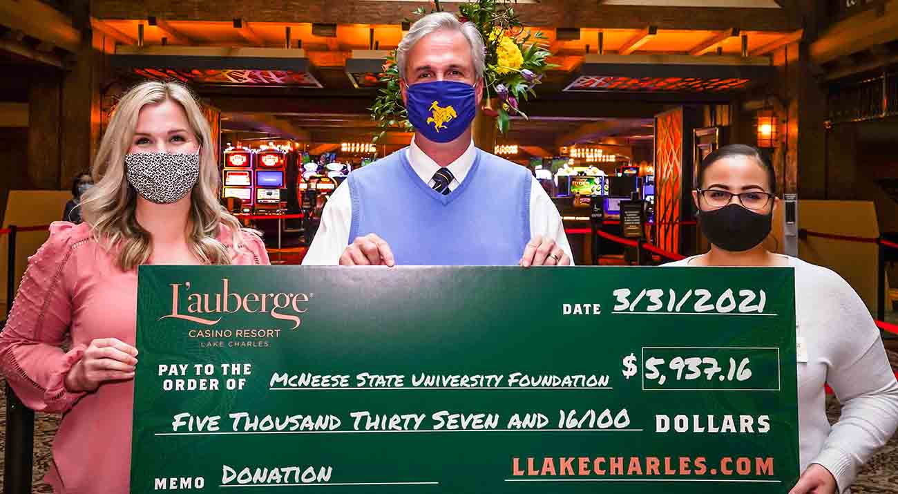 On hand for the presentation are from left: Sarah Camp, L’Auberge community relations partner and executive assistant; Dr. Wade Rousse, McNeese vice president for university advancement and dean of the college of business, and Kalyn Delahoussaye, L’Auberge revenue audit analyst.