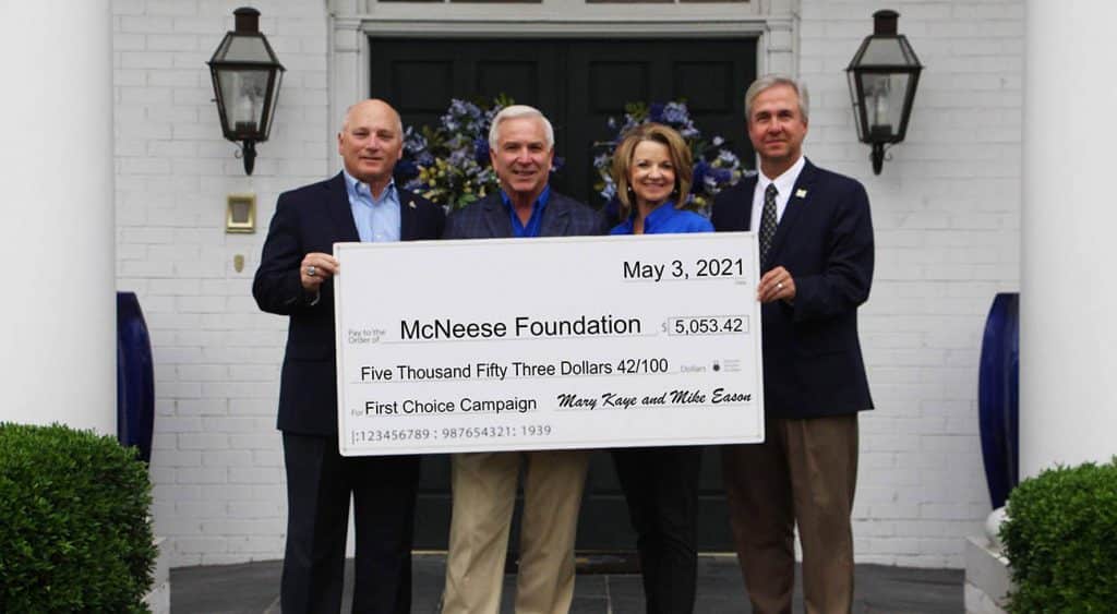 On hand for the presentation are, from left, Dr. Daryl Burckel, McNeese President, Mike and Mary Kaye Eason and Dr. Wade Rousse, McNeese Vice President for University Advancement and Dean of the College of Business.