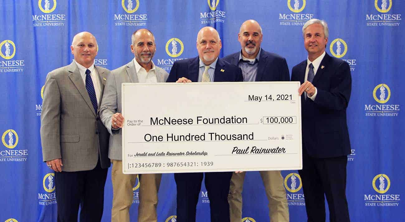 On hand for the presentation are, from left, Dr. Daryl Burckel, McNeese President, Darrell, Paul and Steven Rainwater, and Dr. Wade Rousse, Vice President for University Advancement and Dean of the College of Business.